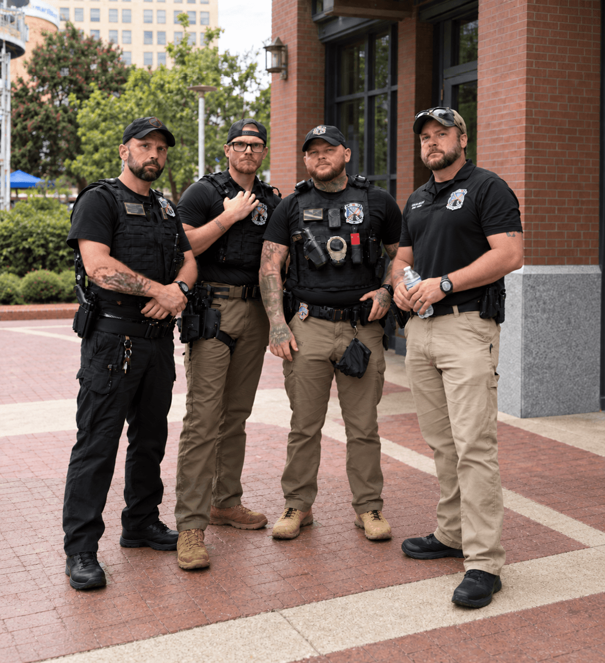 Professional security team standing guard at a gated property entrance